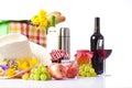 Bottles of wine and Picnic basket with delicious food Royalty Free Stock Photo