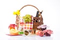 Bottles of wine and Picnic basket with delicious food Royalty Free Stock Photo