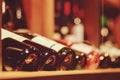 Bottles of wine on in wine bar or wine shop Royalty Free Stock Photo