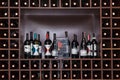 Bottles of wine on the shelves.