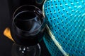 Bottles of wine. Wicker bottle with handle, glass of wine and braided basket