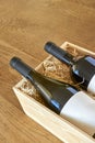 Bottles of wine in wooden gift box with copy space Royalty Free Stock Photo