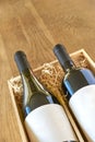 Bottles of wine in wooden gift box with copy space Royalty Free Stock Photo