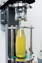 Bottling factory - Beer bottling line for processing and bottling beer into bottles. Royalty Free Stock Photo