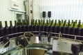 Bottling and sealing conveyor line winery factory Royalty Free Stock Photo