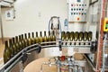 Bottling and sealing conveyor line at winery Royalty Free Stock Photo