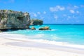 Bottom Bay, Barbados - Paradise beach on the Caribbean island of Barbados. Tropical coast with palms hanging over turquoise sea. Royalty Free Stock Photo