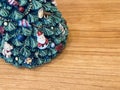 the bottom of the decorated green Christmas tree ceramic with a Santa Claus doll Royalty Free Stock Photo