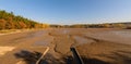 Bottom of drained fishing pond after fish harvest