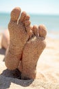 Bottom of feet covered with sand Royalty Free Stock Photo