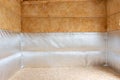 Bottom heat-insulating layer made of reflective polyethylene foam laminated with lavsan for house insulation Royalty Free Stock Photo