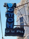 Bottom of the Hill Neon Sign in the Day