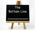 The BOTTOM LINE Concept Visual Pun Royalty Free Stock Photo