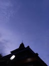 the bottom of a mosque overlooking the blue sky at dusk Royalty Free Stock Photo