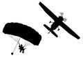 Bottom profile silhouette of sky diver with open parachute