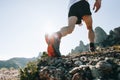 Athletic strong man runs trail ultra marathon