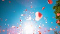 BOTTOM UP: Pink and red pieces of paper in shape of hearts fall from heaven. Royalty Free Stock Photo