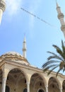 bottom-up view of the inscription of Hosgeldin ya sehri Ramazan between the minarets. Translation from turkish: Welcoming Ramadan