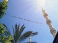 bottom-up view of the inscription of Hosgeldin ya sehri Ramazan between the minarets. Translation from turkish: Welcoming Ramadan