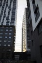 Bottom up view on new modern residential buildings made of red and yellow brick. Medium-rise residential building. Royalty Free Stock Photo