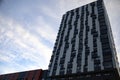 Bottom up view on new modern residential buildings made of red and yellow brick. Medium-rise residential building. Royalty Free Stock Photo