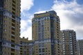 Bottom up view on new modern residential buildings made of red and yellow brick. Medium-rise residential building. Royalty Free Stock Photo