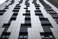 Bottom up view on new modern residential buildings made of red and yellow brick. Medium-rise residential building. Royalty Free Stock Photo