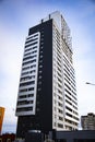 Bottom up view on new modern residential buildings made of red and yellow brick. Medium-rise residential building. Royalty Free Stock Photo