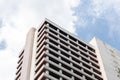 Bottom up view old apartment building with blue sky background Royalty Free Stock Photo