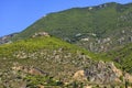 A bottom-up view of two monasteries, one male and one female, in Loutraki, Greece Royalty Free Stock Photo