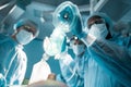 bottom view of african american anesthetist holding oxygen mask above patient Royalty Free Stock Photo