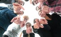 Ambitious young people standing in a circle and pointing at you. Royalty Free Stock Photo