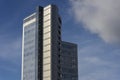 Bottom view of a beautiful tall modern office building against the sky Royalty Free Stock Photo