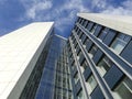 Bottom view of a beautiful tall modern office building against the sky Royalty Free Stock Photo