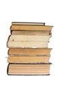 bottom view of a book stack - page edges of an old closed hardcover books stacked, isolated on white with clipping path Royalty Free Stock Photo