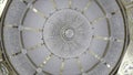 Bottom view of dome with crystal chandelier. Scene. Beautiful bright dome inside temple. Domed vault with crystal Royalty Free Stock Photo