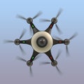 Bottom view of a drone with surveillance camera.