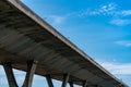 Bottom view of elevated concrete highway. Overpass concrete road. Road flyover structure. Modern motorway. Transportation Royalty Free Stock Photo