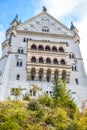 Bottom view of the facade of the old castle with balconies with columns Royalty Free Stock Photo