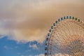 Bottom view, Giant funfair ferris wheel against sky Royalty Free Stock Photo