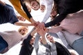 Bottom view. a group of young people showing their unity Royalty Free Stock Photo