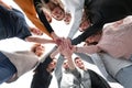 Bottom view. a group of young people showing their unity Royalty Free Stock Photo