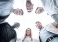 Bottom view.a group of young people stand together, forming a circle Royalty Free Stock Photo