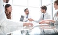 Bottom view.handshake business partners over the Desk Royalty Free Stock Photo