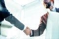 Bottom view. handshake of business partners over the Desk Royalty Free Stock Photo