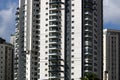 Bottom view of high-rise buildings in a big city against a blue sky. Royalty Free Stock Photo