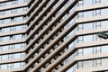 Bottom view of high-rise buildings in a big city against a blue sky. Royalty Free Stock Photo