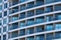 Bottom view of high-rise buildings in a big city against a blue sky. Royalty Free Stock Photo