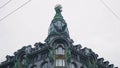 Bottom view of historic city building with greek sculptures. Action. Bottom view on corner building with beautiful and Royalty Free Stock Photo