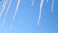 Bottom view of icicles melting under the early spring sun. Concept. Colors of nature, drops of water falling down from Royalty Free Stock Photo